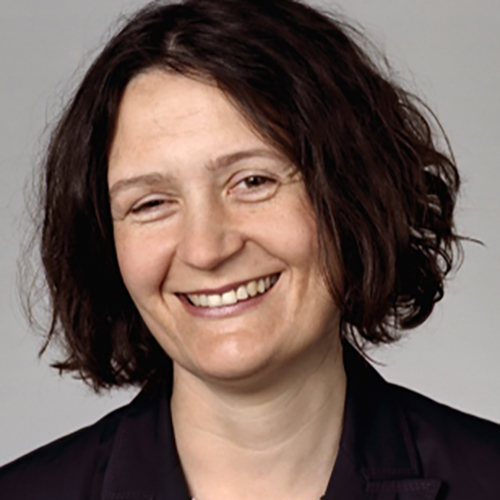 Portrait photograph headshot of Isabelle Stoeckert (Bayer) smiling
