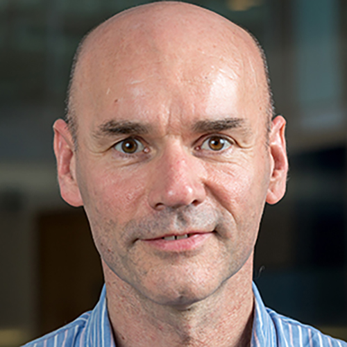 Portrait photograph headshot of Peter Arlett (European Medicines Agency) grinning