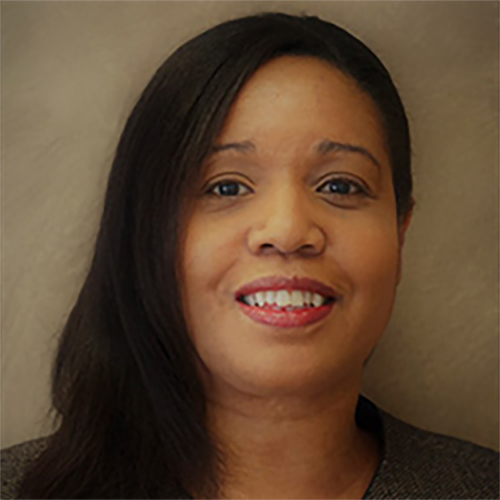 Portrait headshot close-up photograph view of Marcia Bailey smiling