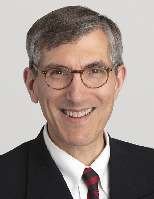 Portrait headshot close-up photograph view of Peter Marks smiling